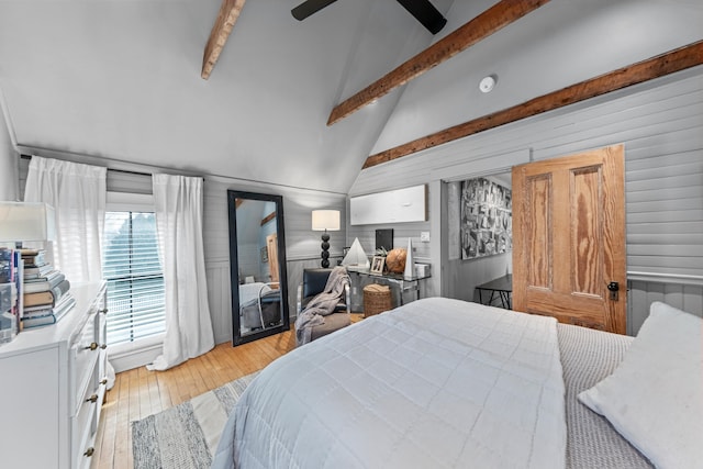 bedroom with beamed ceiling, light hardwood / wood-style floors, high vaulted ceiling, and ceiling fan