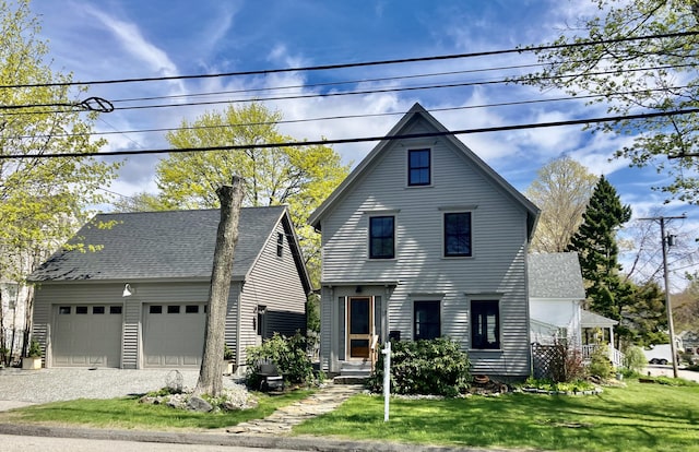 17 Mountain St, Camden, ME 04843 - view of front of house with a chimney, a front lawn, a garage, a shingled roof, and an outdoor structure