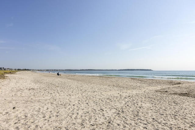 view of water feature with a beach view