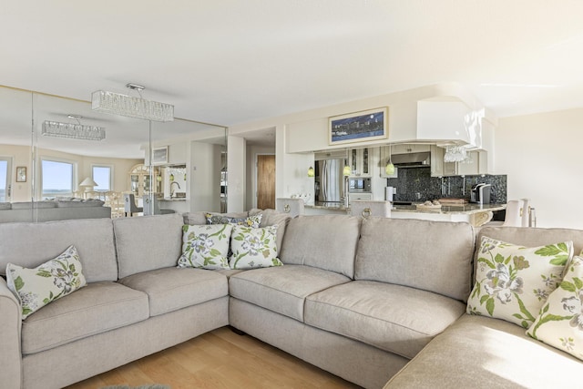 living room with light hardwood / wood-style floors