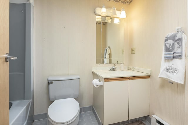 bathroom with toilet, a bathtub, tile patterned flooring, a baseboard radiator, and vanity