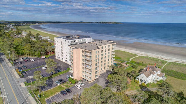 bird's eye view with a beach view and a water view