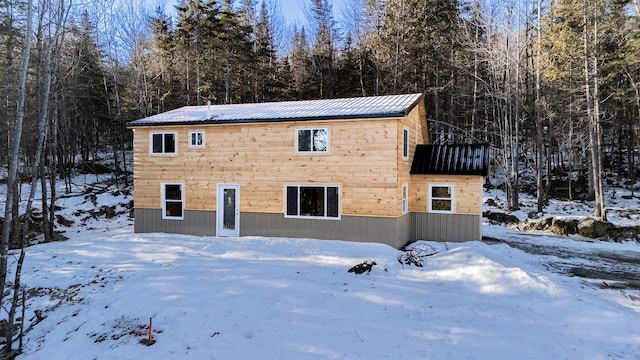 exterior space featuring metal roof