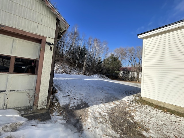 view of yard covered in snow