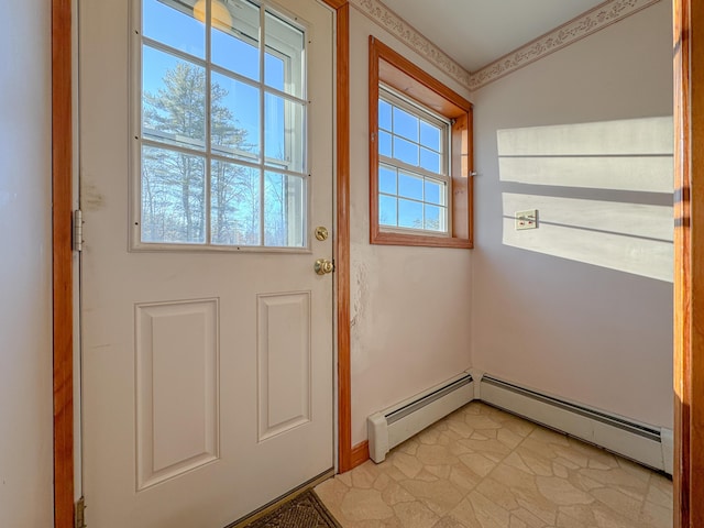 doorway to outside featuring baseboard heating