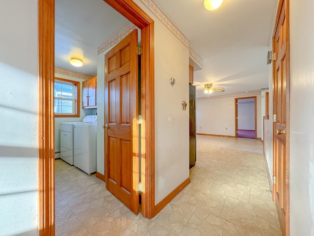 corridor featuring separate washer and dryer