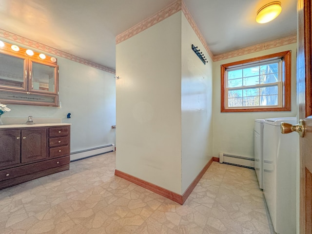 bathroom with vanity and baseboard heating