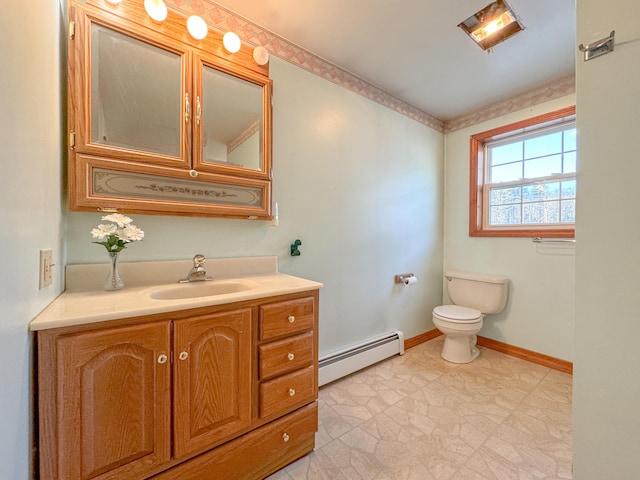 bathroom featuring vanity, a baseboard radiator, and toilet