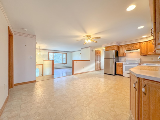 kitchen featuring white range with electric cooktop, ceiling fan with notable chandelier, crown molding, sink, and stainless steel fridge