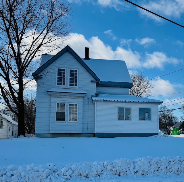 view of snow covered property