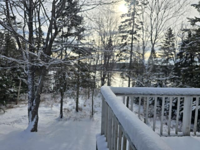 view of snow covered deck