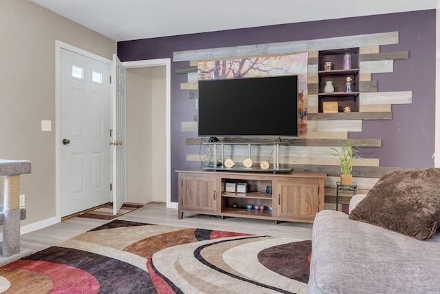 living room with light hardwood / wood-style flooring