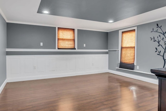 spare room with wood-type flooring