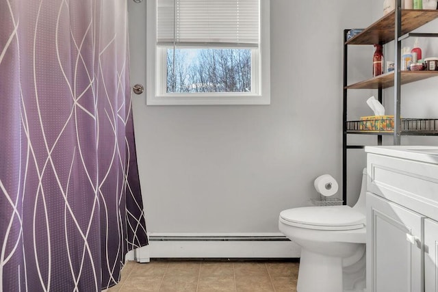 bathroom featuring toilet, tile patterned flooring, a baseboard heating unit, and a shower with curtain