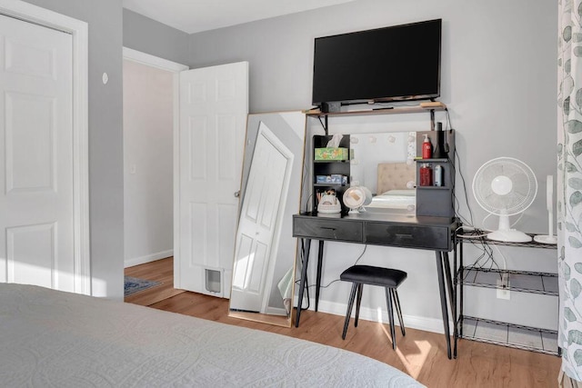 bedroom with light hardwood / wood-style floors