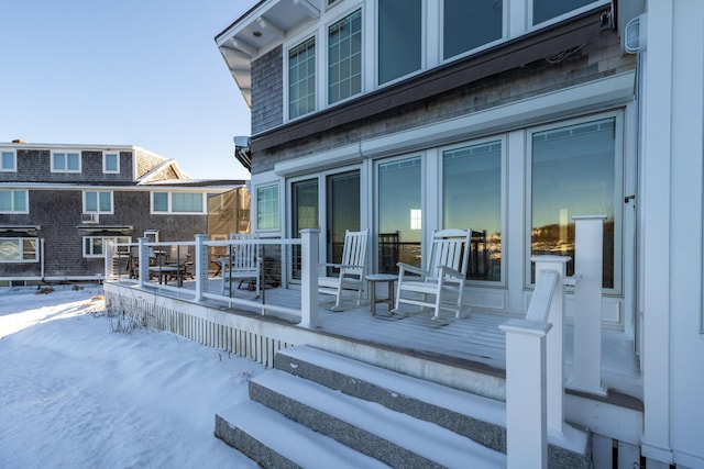 view of snow covered deck