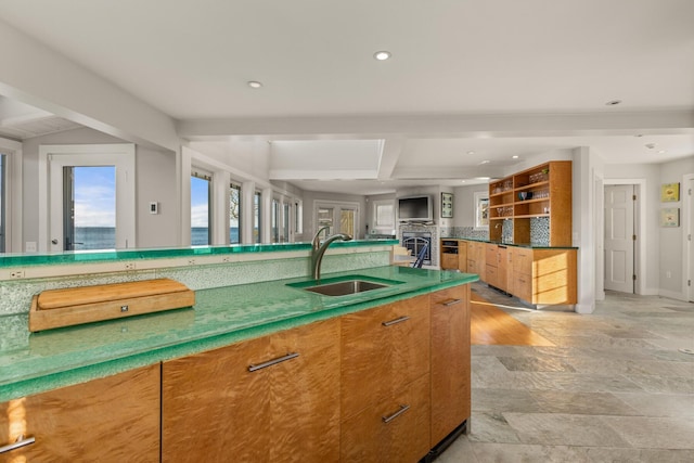 kitchen with tasteful backsplash and sink