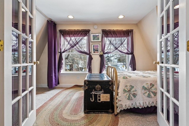 10 Seaside Ave, Saco, ME 04072 - bedroom featuring french doors, carpet flooring, multiple windows, baseboards, and recessed lighting