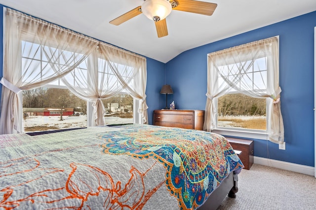 10 Seaside Ave, Saco, ME 04072 - carpeted bedroom featuring multiple windows, baseboards, lofted ceiling, and a ceiling fan