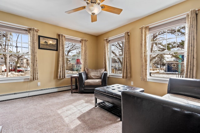 10 Seaside Ave, Saco, ME 04072 - sitting room with baseboard heating, carpet flooring, and a ceiling fan