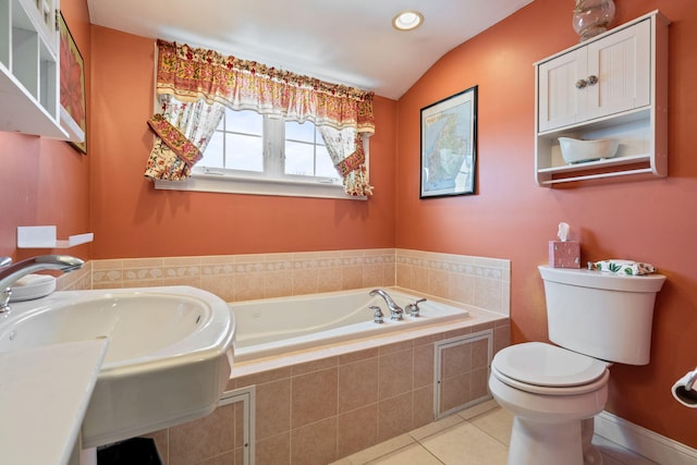 10 Seaside Ave, Saco, ME 04072 - full bath featuring tile patterned floors, toilet, a garden tub, a sink, and vaulted ceiling
