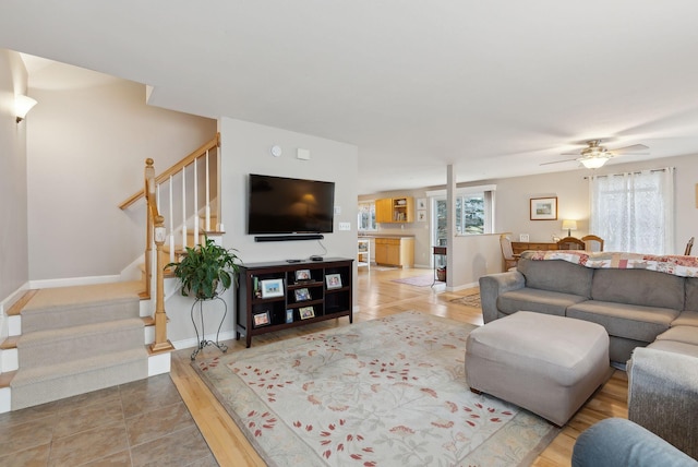 living room with ceiling fan and wood-type flooring