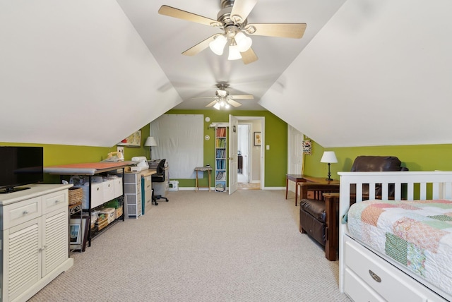 carpeted bedroom with vaulted ceiling and ceiling fan