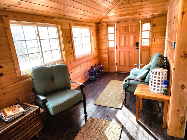 living room featuring dark wood-type flooring, vaulted ceiling, and wooden ceiling