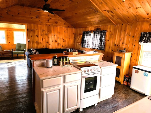 kitchen with wood ceiling, vaulted ceiling, wooden walls, white cabinets, and white range with electric cooktop