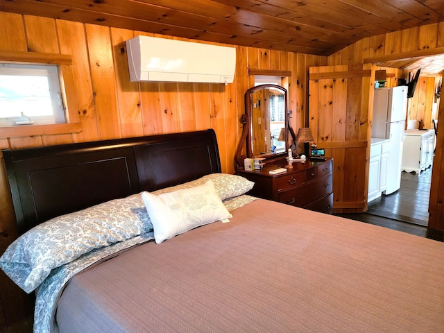 bedroom with wood walls, lofted ceiling, wooden ceiling, white refrigerator, and a wall mounted AC