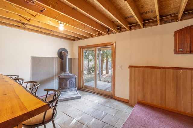 doorway featuring a wood stove