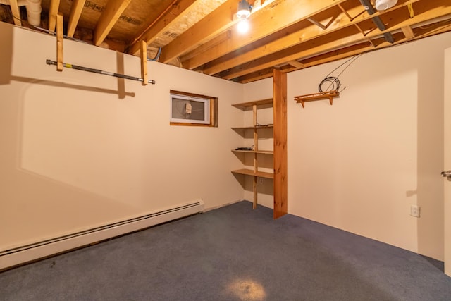 basement featuring a baseboard radiator