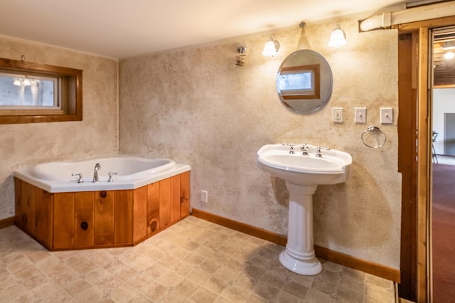 bathroom featuring a washtub