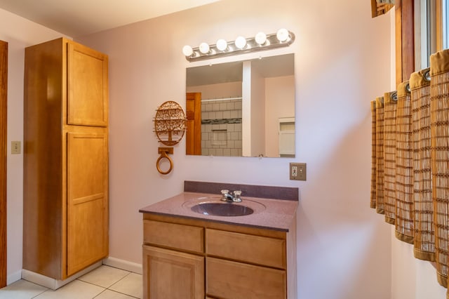 bathroom with vanity and tile patterned flooring