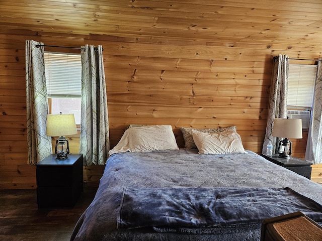 bedroom with cooling unit, wooden walls, and wood ceiling