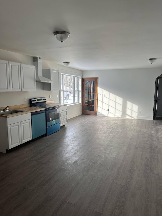 kitchen with stainless steel electric range oven, sink, wall chimney exhaust hood, dark hardwood / wood-style floors, and white cabinets