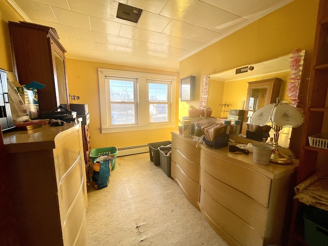 kitchen featuring a baseboard radiator and ornamental molding