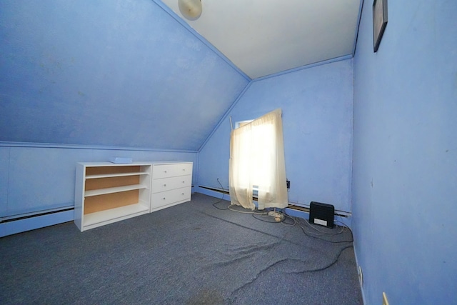 bonus room featuring dark colored carpet and vaulted ceiling