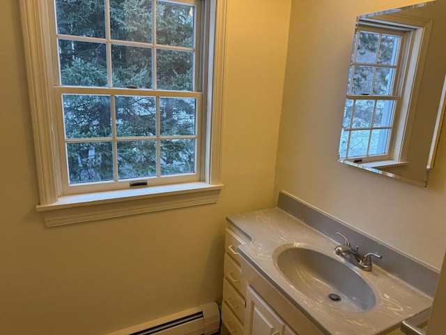 bathroom featuring vanity and a baseboard radiator