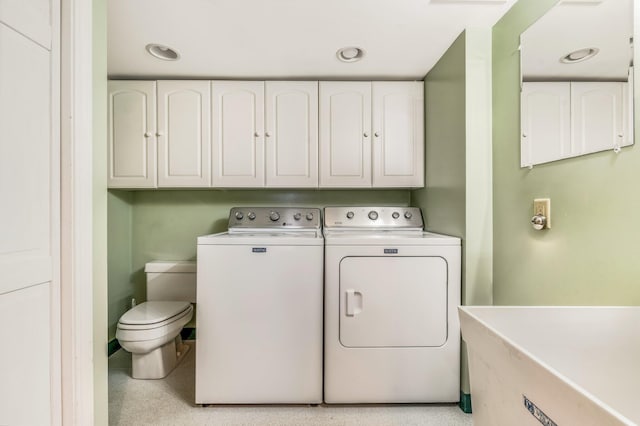 laundry room featuring washer and dryer