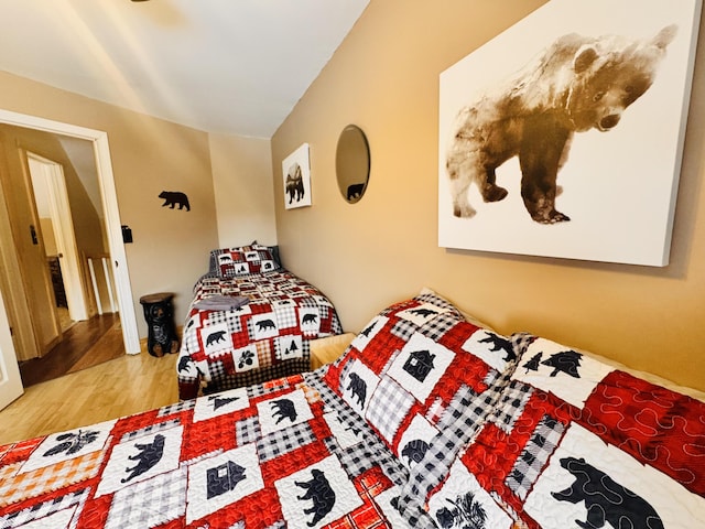 bedroom featuring wood-type flooring