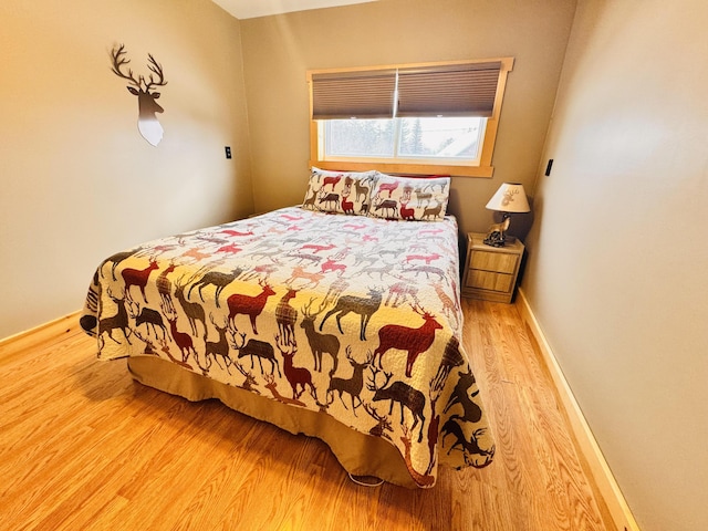 bedroom featuring hardwood / wood-style floors