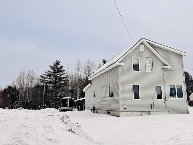 view of snow covered property