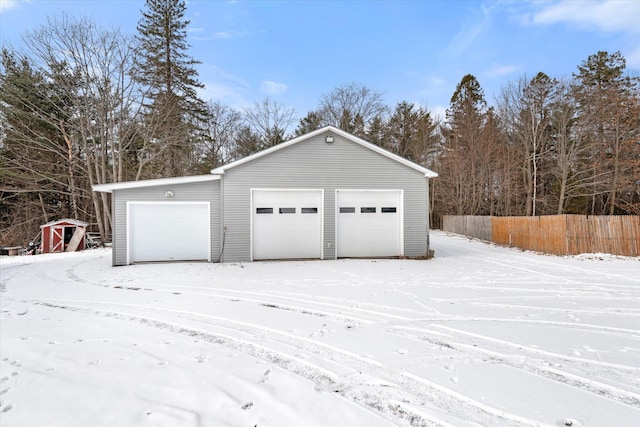 view of snow covered garage