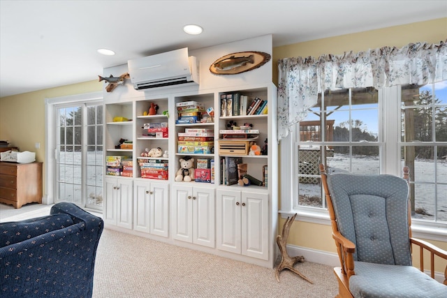 interior space featuring an AC wall unit and carpet floors