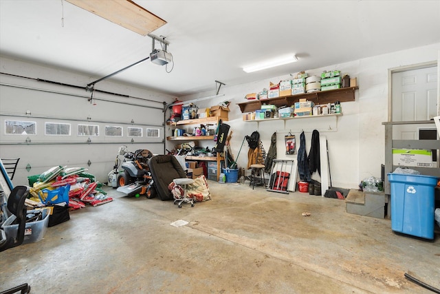 garage featuring a garage door opener