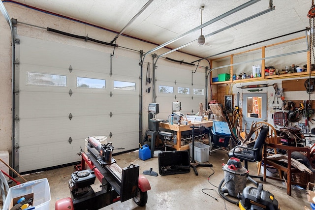 garage with a workshop area