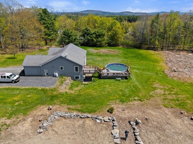 12 Ashlee Ln, Orrington, ME 04474 - aerial view of property and surrounding area with a heavily wooded area