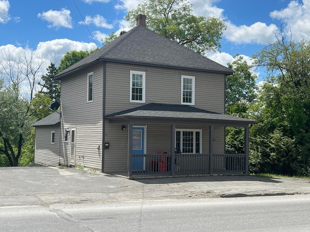 view of property with a porch