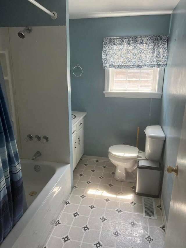 full bathroom with toilet, vanity, and shower / bathtub combination with curtain